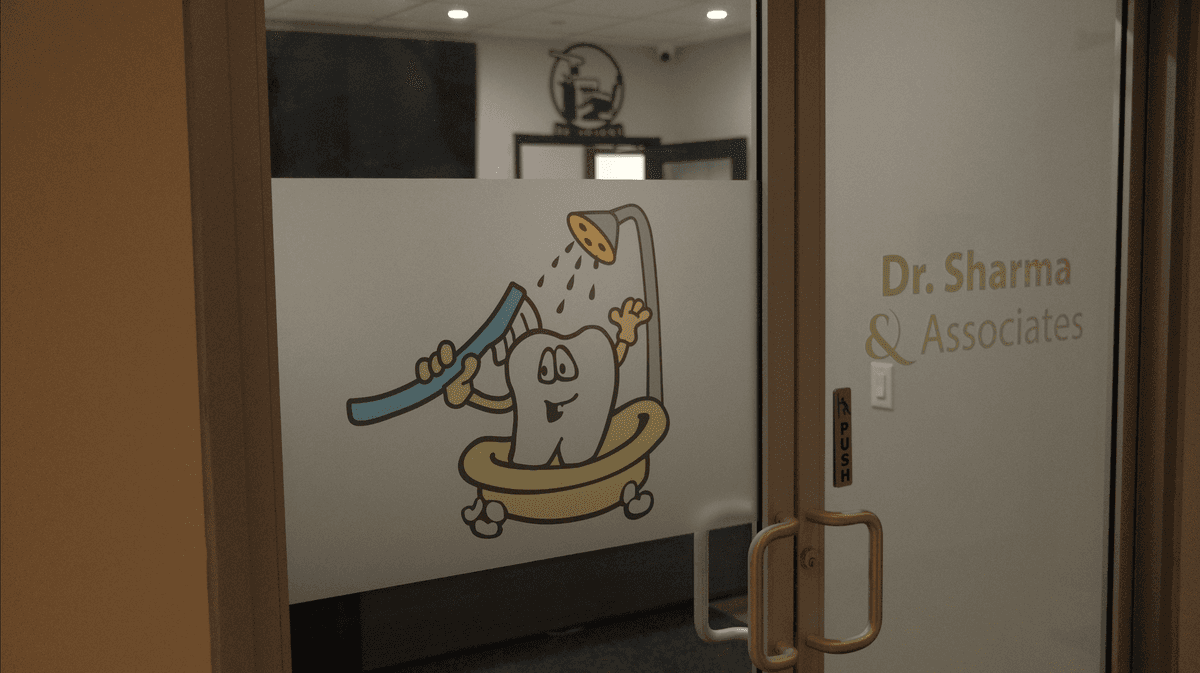 Our tooth mascot on the office door